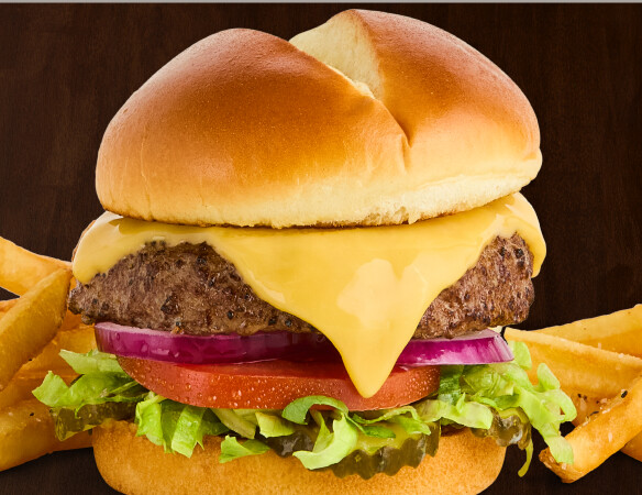 $6.99 Ruby's Cheeseburger  Our classic burger topped with American cheese, lettuce, onion, tomato, and pickles. Served with fries or tots.