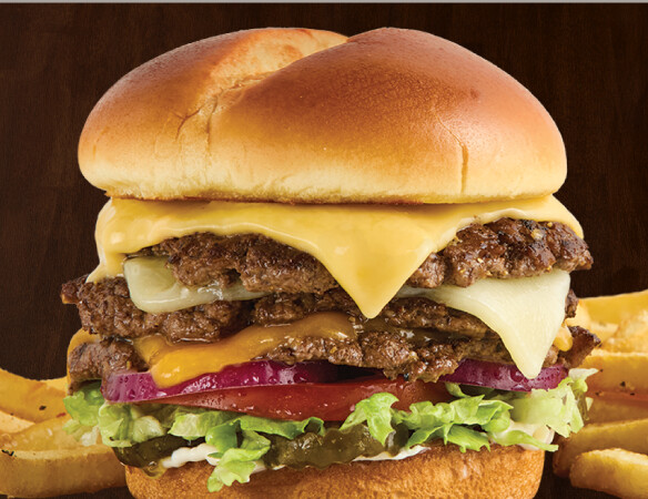 $8.99 Triple Smashed Burger  Three smashed beef patties with American, Swiss, cheddar, bacon, lettuce, tomato, onion, pickle, and mayo. Served with fries or tots.
